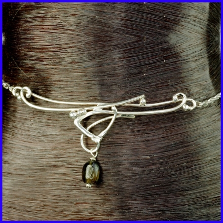 Thin silver ankle chain with pattern. Original jewel made by hand