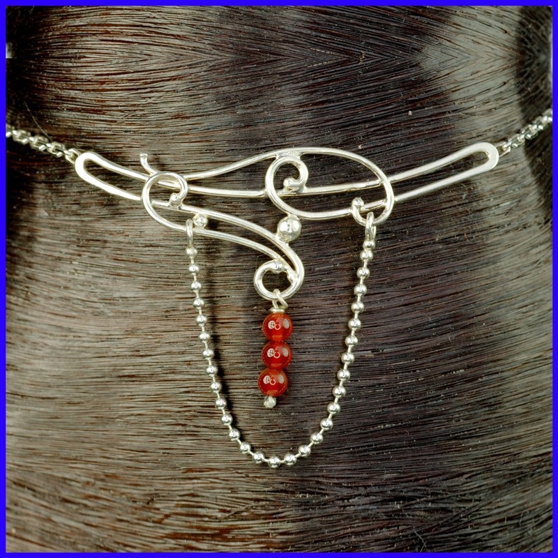 Thin silver ankle chain with motif and stone. Original jewel made by hand