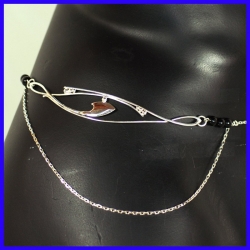 Cutting chain with pattern and fine stones. Sensual silver jewel.