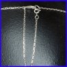 Cutting chain with pattern and fine stones. Sensual silver jewel.