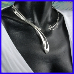 Original asymmetrical torque in pure silver. Handmade designer jewelry