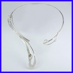 Original asymmetrical torque in pure silver. Handmade designer jewelry