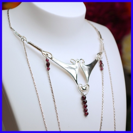 Necklace in pure silver with garnets. Handmade designer jewelry