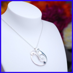 Pure silver pendant with hematite. Handmade designer jewelry