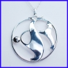 Fantasy pendant in pure silver. Handmade designer jewelry