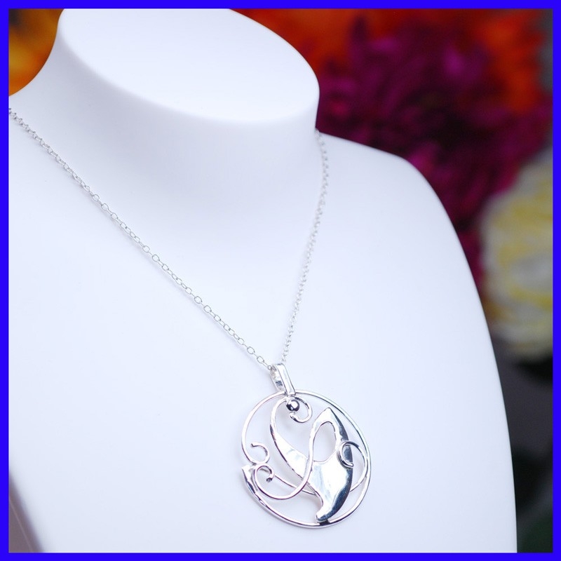 Celtic pendant in pure silver. Handmade designer jewelry