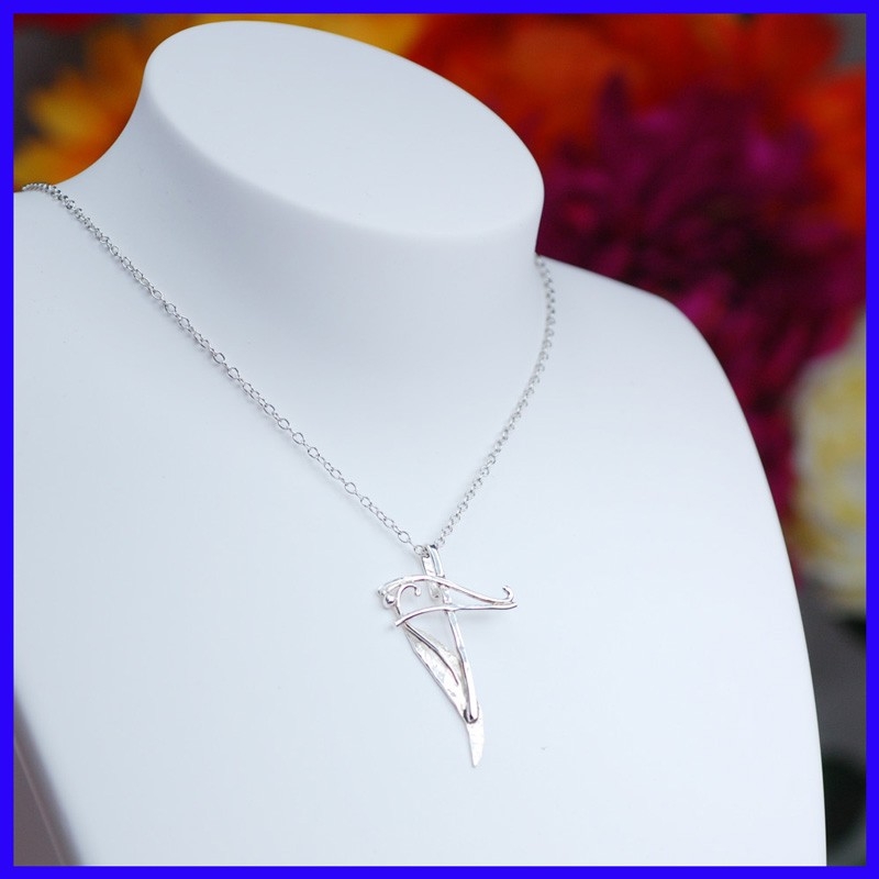 Handmade silver cross. Cross-shaped creator's pendant