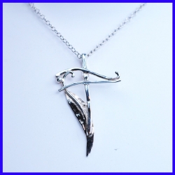 Handmade silver cross. Cross-shaped creator's pendant
