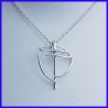 Cross in pure silver. Handmade designer jewelry