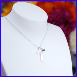 Handmade silver cross pendant by a jeweller. Original jewelry