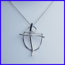 Cross in pure silver. Handmade designer jewelry