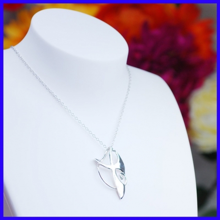 Handmade silver cross. Cross-shaped pendant made by a jeweller