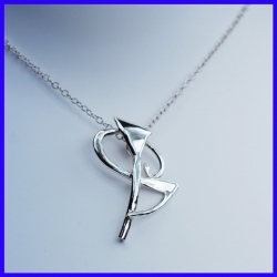 Cross in pure silver. Handmade designer jewelry