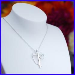 Cross in pure silver. Handmade designer jewelry