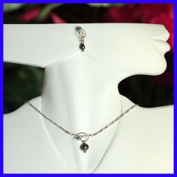 Ensemble collier boucles d’oreille argent artisanale.