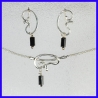 Ensemble collier boucles d’oreille argent artisanale.