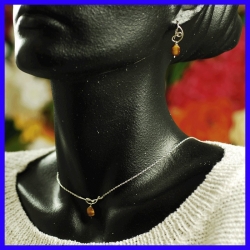 Parure collier boucles d’oreille argent de créateur.