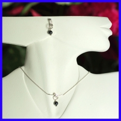 Parure collier boucles d’oreille argent de créateur.