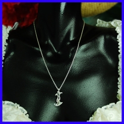 Pendant marine anchor in pure silver. Handmade designer jewelry