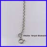 Discret pendentif argent et boule en or.