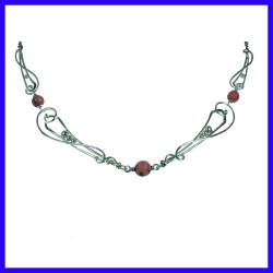 Art nouveau necklace in pure silver with rhodonites. Handmade designer jewelry.