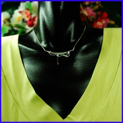 Necklace graphics in pure silver with ox eyes. Handmade designer jewelry.