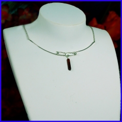 Modern pure silver necklace with an ox eye. Handmade designer jewelry.