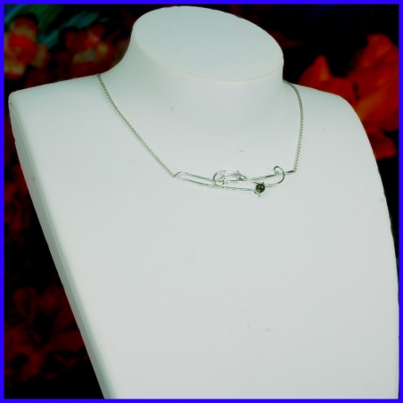 Pure silver vegetable necklace with rhodonite. Handmade designer jewelry.