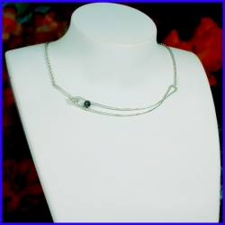 Graphic necklace in pure silver with a hematite. Handmade designer jewelry.