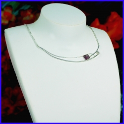 Necklace purified in pure silver with a fluorite. Handmade designer jewelry.