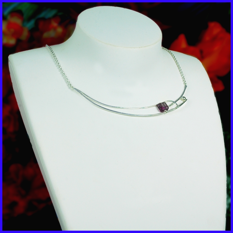Necklace purified in pure silver with a fluorite. Handmade designer jewelry.