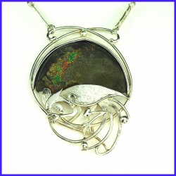 Necklace in pure silver with a rainbow pyrite. Handmade designer jewelry.