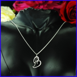 Handmade silver B pendant. Designer and handcrafted jewelry.