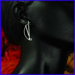 Silver earrings. Designer and handmade jewel.