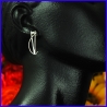 Silver earrings. Designer and handmade jewel.