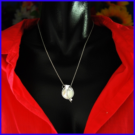 Silver and mother of pearl pendant. Designer and handmade jewel.