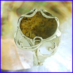 Silver ring with a yellow moss quartz