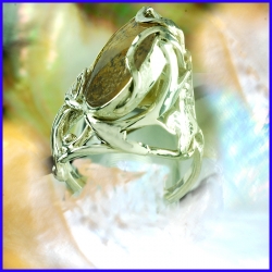 Silver ring with a yellow moss quartz