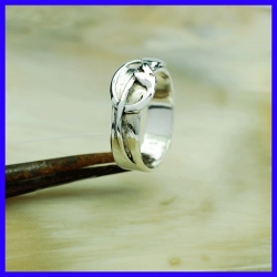 Silver snake ring for men created by a solid silver jeweler.