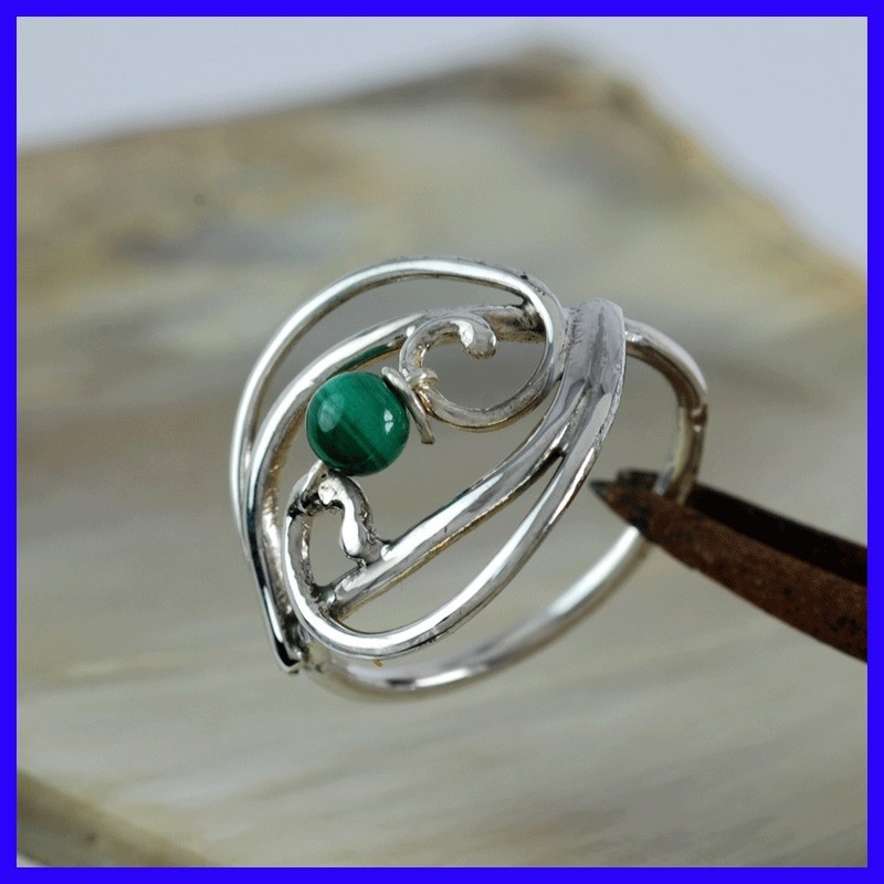 Silver and Malachite ring and handmade. Jewel of creator and artisanal. Silver and Malachite ring and handmade. Jewel of creator and artisanal.
