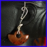 Pure silver earring with a red jasper. Handmade designer jewelry.