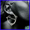 Pair of silver creole earrings. Jewelry designer for women.