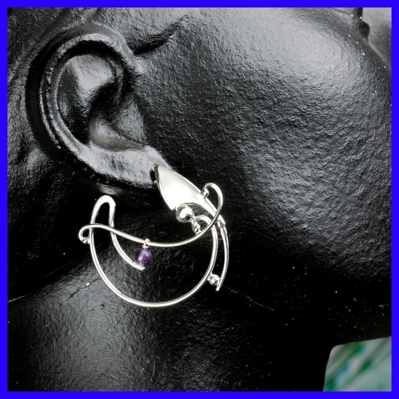 Silver creole earrings decorated with an Amethyst Creator's jewellery.