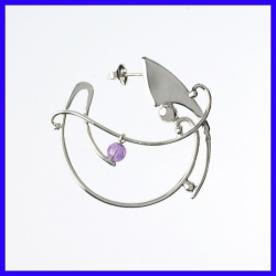 Silver creole earrings decorated with an Amethyst Creator's jewellery.