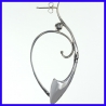 Pair of silver creole earrings. Jewelry designer for women.