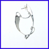 Pair of silver creole earrings. Jewelry designer for women.