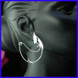 Pair of handmade silver earrings. Jewelry designer in small series