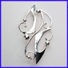 Brooch in pure silver. Jewel of a handmade designer.